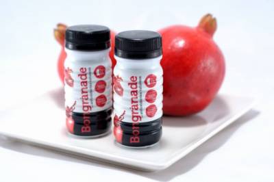 Zumo de granada 100 % natural. - Productos Alicantinos
