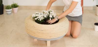 Maceta DIY ccon un neumáticos reciclado | SIGNUS Blog