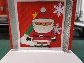 Un papa Noel coloreado con acuarelaas